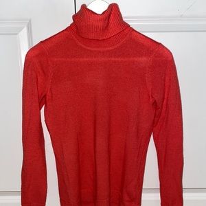 Reddish-orange longsleeve turtleneck
